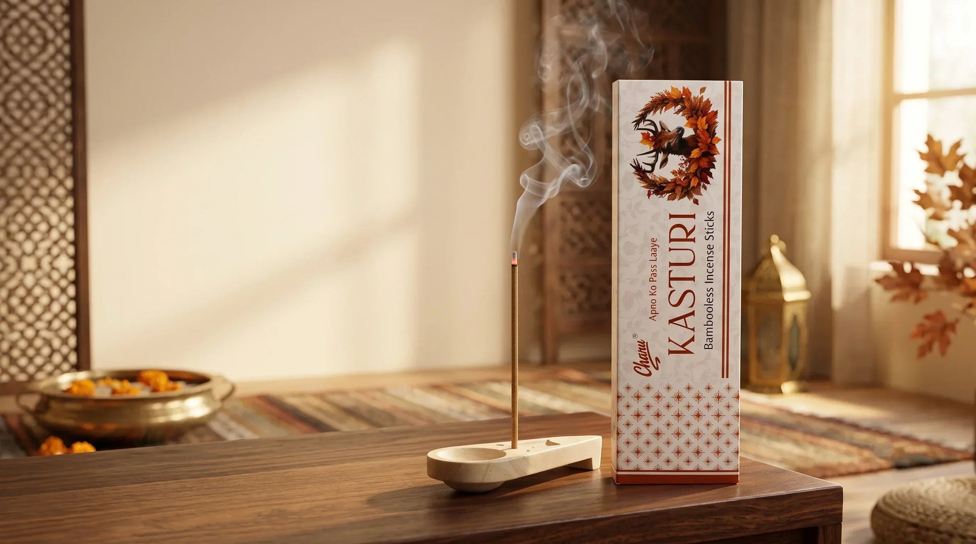 Charu Kasturi incense sticks burning with aromatic smoke in a peaceful home setting.