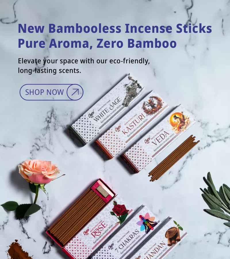 Charu Bamboooless Incense Sticks in assorted fragrances with rose, sage bundle, diffuser, and perfume bottle on a marble background.